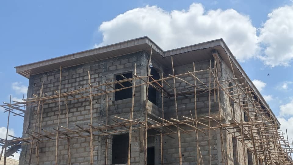 On-site College of Nursing construction progress showing structural works